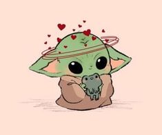 a baby yoda with hearts on it's head holding a small object in its hands