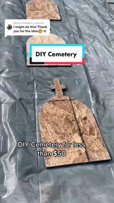 an image of a wooden cross on top of a sheet of plastic with the words diy cemetery for less than $ 50