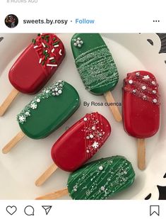 some red and green pops are on a white plate