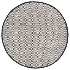 a black and white round rug on a white background with an oval pattern in the middle