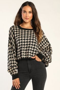 Cozy, Cute, and CovetedThis midweight houndstooth sweater features a wide scoop neckline that effortlessly drapes off the shoulder as it tops a cropped bodice. Long sleeves with dramatic drop shoulders create a snuggly, dolman-style effect before ending with fitted cuffs. Fit: This garment fits true to size. Length: Size medium measures 18.5" from shoulder to hem. Bust: Great for any cup size. Waist: Not Fitted - comfortable room throughout midsection. Undergarments: May be worn with any standar Houndstooth Sweater, Dolman Sleeve Sweater, Lulu Fashion, Sweater Crop, Chic Sweaters, Black And Beige, Houndstooth Pattern, Dolman Sleeve, Cropped Sweater