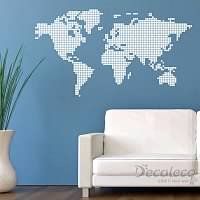 a living room with a white couch and a wall decal that has the world map on it