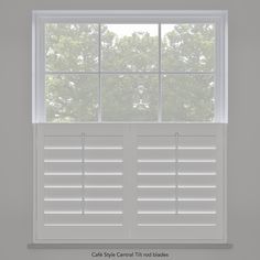 an open window with white shutters and trees in the background