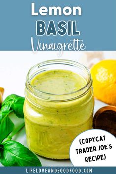 lemon basil vinaigrette recipe in a mason jar with fresh basil leaves around it