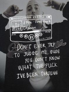 a man in a suit holding up a sign with words on it that say don't ever try to judge me, do you don't know what the luck i've been through