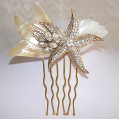 a close up of a hair comb with flowers on it