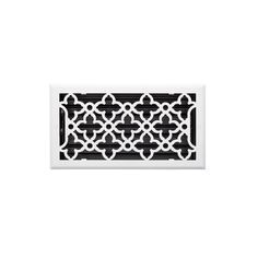 a white and black vent register cover with an intricate design on the side, in front of