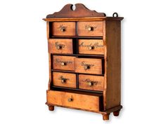 an old wooden cabinet with many drawers