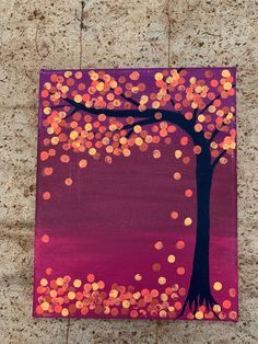 an acrylic painting of a tree with orange and pink dots in the background