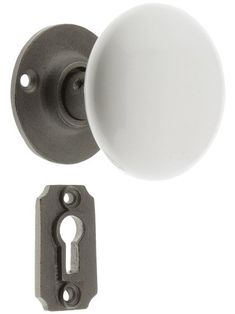 an image of a door knob and keyhole on a white background with clippings