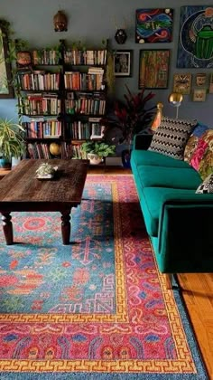 a living room filled with furniture and lots of books