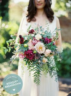 a woman holding a bouquet of flowers in her hand on top of a cell phone