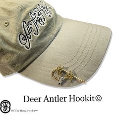 A must have accessory for the avid hunter! Showcase your hunting hat with this beautiful detailed deer skull hat clip! Elevate your style and showoff your love for the wildlife. The Intricate detail shows our commitment to quality. The Deer Skull on this Hookit is hand-crafted in nickel and cadmium free pewter on a gold plated eagle claw hook HNT602DA MADE IN THE USA Hat Hook, Eagle Claw, Hunting Hat, Hat Clip, Skull Hat, Deer Skull, Hat Hooks, Deer Skulls, Hat Clips