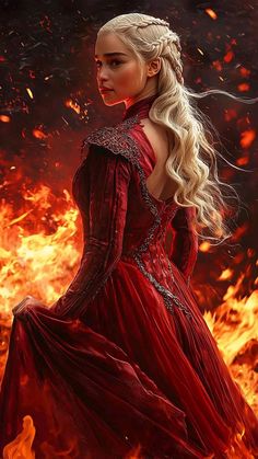 a woman in a red dress with long blonde hair standing in front of a fire