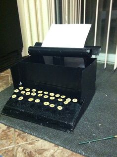 an old fashioned typewriter sitting on the floor