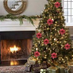 a decorated christmas tree in front of a fireplace