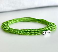 Mindfulness and sophisticated style meld together flawlessly in this wrap bracelet designed to help you set your personal intention as you wrap the bracelet on your wrist. From MaeMarie Wraps. Green Multi-strand Wrap Bracelet As Gift, Trendy Multi-strand Bracelet For Gifts, Summer Multi-strand Bracelets As A Gift, Summer Multi-strand Bracelets As Gifts, Multi-strand Bracelets For Summer Gifts, Summer Gift Multi-strand Bracelets, Adjustable Multi-strand Bracelets For Summer, Trendy Multi-strand Wrap Bracelet Gift, Summer Multi-strand Beaded Bracelets As Gift