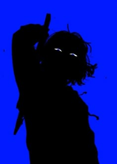 the silhouette of a man with a knife in his hand, against a blue background