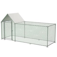 a chicken coop with a white roof