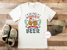 The Most Wonderful Time For A Beer Shirt.  *Vintage White shirt displayed on main photo. Shirt is unisex, soft and true to size. *If you like this design, but want it on a different style or brand of shirt, send a message before purchase. --------------------------------------------- PROCESSING TIME: 3-5 business days (M-F) before an item ships. If you need something sooner, please send a message before purchase. SIZING: A size chart is available in the photos. Unisex sizing - if you prefer a mo Christmas Beer Shirts, Vintage White Shirt, Christmas Party Shirt, Christmas Beer, Shirt Display, Christmas Party Shirts, Funny Christmas Shirts, Beer Shirts, Funny Christmas