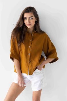 100% Linen blouse with a cotton buttons. LINEN WITH OEKO-TEX Relaxed Fit Ramie Blouse For Daywear, Casual Ramie Tops For Daywear, Relaxed Fit Ramie Tops For Daywear, Spring Beige Tops With Buttons, Spring Flax Tops With Buttons, Spring Flax Top With Buttons, Linen Short Sleeve Blouse For Daywear, Short Sleeve Linen Blouse For Daywear, Classic Linen Tops With Button Cuffs