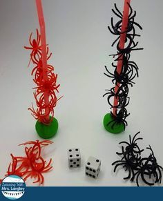 halloween games for kids to play on the table with spider and pumpkins in them