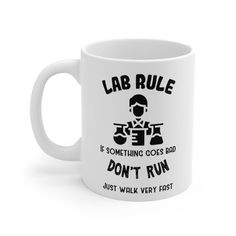 a coffee mug that says lab rules if something goes bad, don't run just walk very fast