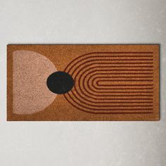 a door mat with an abstract design on it