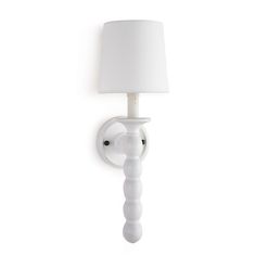 a white wall mounted light with a white shade on it's face and arm