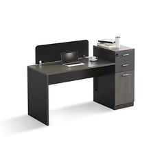 an office desk with a computer on top of it and a drawer under the desk