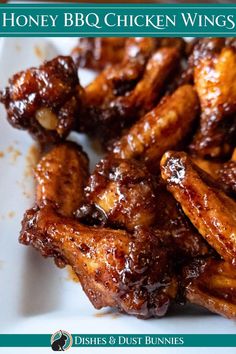 honey bbq chicken wings on a white plate with the words, honey bbq chicken wings