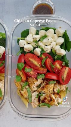 two plastic containers filled with chicken, tomatoes and pasta salads next to each other