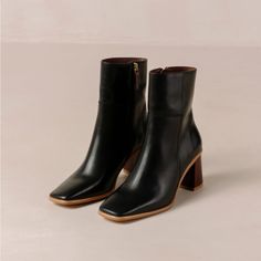 Incredible. They Still Have The Plastic On The Bottom. Never Worn. I Get Complimented On My Brown Versions All The Time. These Are Just A Touch Too Small As My Foot Has Grown Larger Than I Expected. This Is Definitely A True 10 1/2 As I Am 11 Right Now. Modern Black Heeled Boots With Contrasting Heel, Black Square Toe Boots With Padded Heel, Classic Black Heeled Boots With Square Toe, Classic Black Square Toe Heeled Boots, Black Ankle-high Heeled Boots For Office, Ankle-high Black Heeled Boots For Office, Black Stacked Heel Boots For Office, Black Ankle Boot Heels For Business, Black Heeled Boots With Stacked Heel For Business