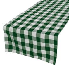 a green and white checkered table runner