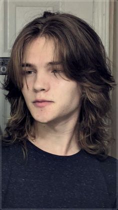 Long hair for men: 15 trendy hairstyles in 2024 and maintenance tips Wolfcut Hair Long Guy, Long Layered Male Hair, Wolfcut For Men Long Hair, 90s Hairstyles Guys, Wolfcut Reference Photo, Straight Long Mens Hair, Styled Long Hair Men, Wolfcut Hair Long Straight Men, Bangs For Men Long Hair