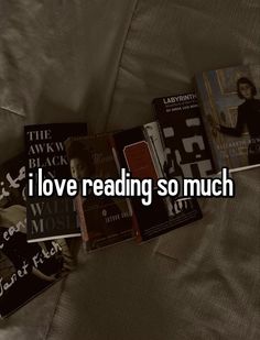 some books are laying on a bed with the words love reading so much