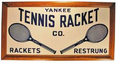 an old tennis racket sign is hanging on a wooden frame with two racquets