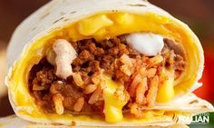 a burrito filled with meat and cheese