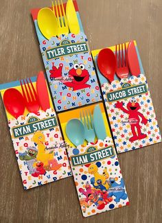 the sesame street children's cutlery set includes plastic forks, spoons and knives