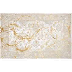 a rug with gold and white designs on it