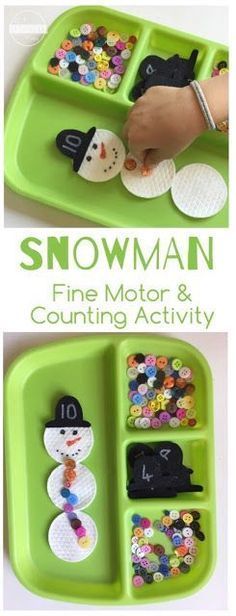 a green tray filled with lots of buttons and snowman magnets on top of it