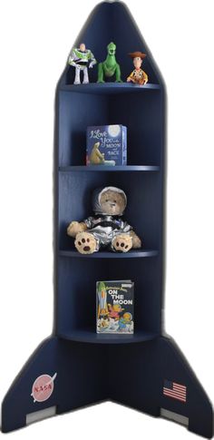 a toy rocket ship shelf with books and toys on it's shelves in the shape of an airplane