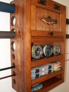 a wooden shelf with many different items on it