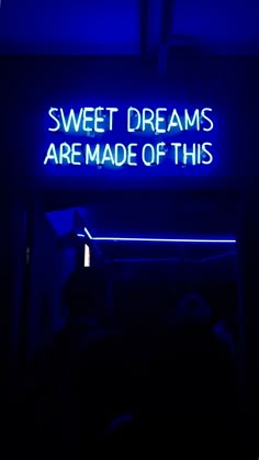 a neon sign that says sweet dreams are made of this