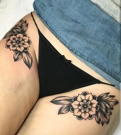 a woman's stomach with flowers on it