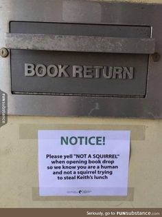 a sign that is on the side of a door saying, book return notice please all not a journal when opening book drops so we know you are a human