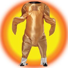 a man in a shiny gold costume is standing with his arms spread out and hands on hips