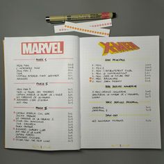 an open comic book with the title's list on it and pencils next to it