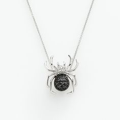 Spider lovers of all ages will adore the shimmering black and white diamonds of this unique pendant. Comes in a gift box. Pendant Details: Pendant length: .75 in. Chain length: 18 in. Clasp: spring-ring Metal: sterling silverDiamond Details: Total weight: 1/10 ct. Cut: round Color: black & white Setting: prongImage(s) may be enlarged to show detail.Diamond weights are approximate. Diamond total weights may vary between .01 and .08 ct. Some diamonds have fewer than 17 facets.Gemstones may hav Black Diamond Jewelry For Gifts, Black Diamond Jewelry Gift, Black Diamond Jewelry For Gift, Elegant Black Diamond Necklace Gift, Diamond Eyes Pendant Jewelry For Anniversary, Gift Black Diamond Necklace, Diamond White Sterling Silver Necklaces For Evening, Silver Jewelry With Black Diamonds, Black Necklaces With Diamond Accents For Gift