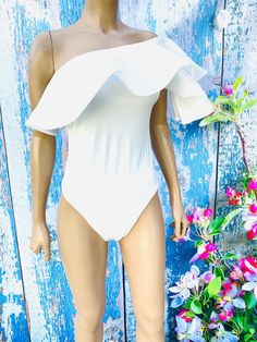 Chic bodysuit that you can match with almost anything. Limited sizes. Comes in small and medium. 100 % Polyester Hand Wash Cold. Catsuit, Womens Bodysuit, One Shoulder, Hand Wash, One Piece, Clothes For Women, Trending Outfits, Ships, Clothes